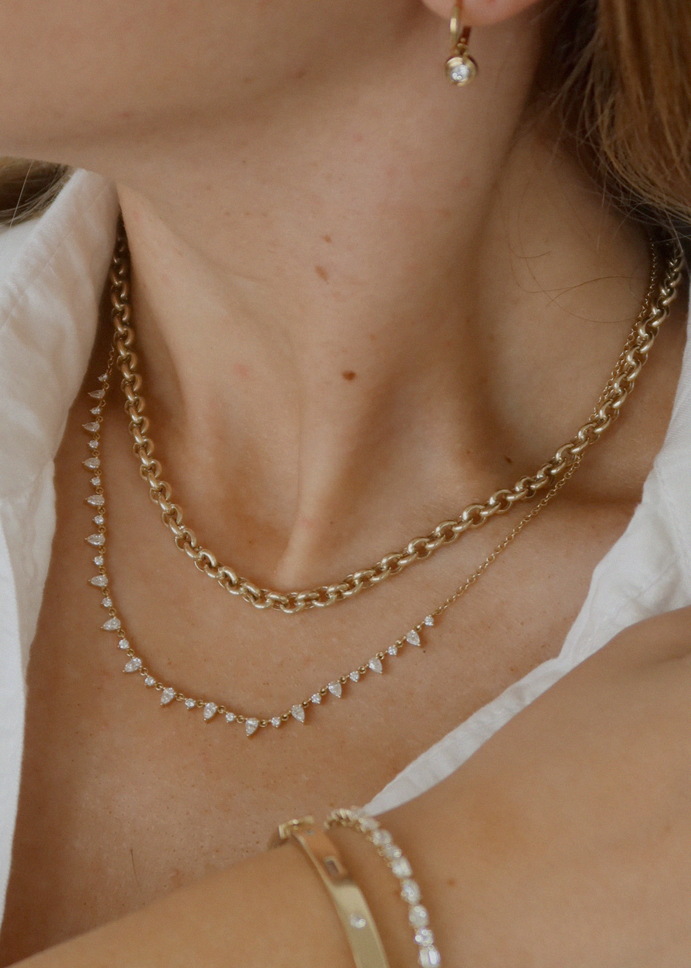 woman wearing a Kinn 14k Gold Juliette Diamond Row Necklace