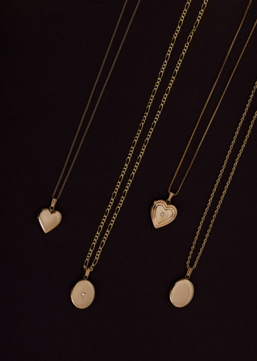 alt="Maison Ribbed Heart Locket Necklace II"