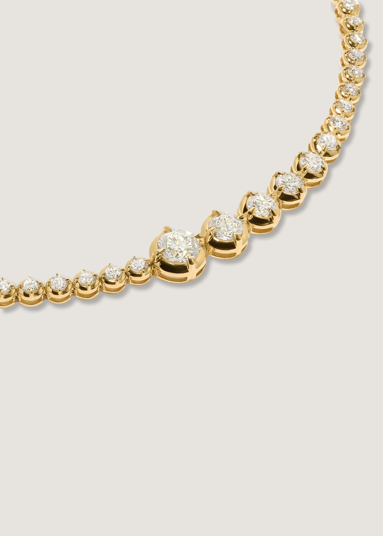 Close up view of a Kinn x Prince 14k Gold Naomi Graduated Diamond Tennis Bracelet