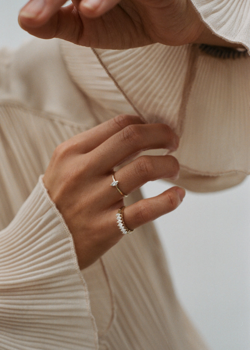 alt="Seven Marquise Ring with marquise diamond ring"