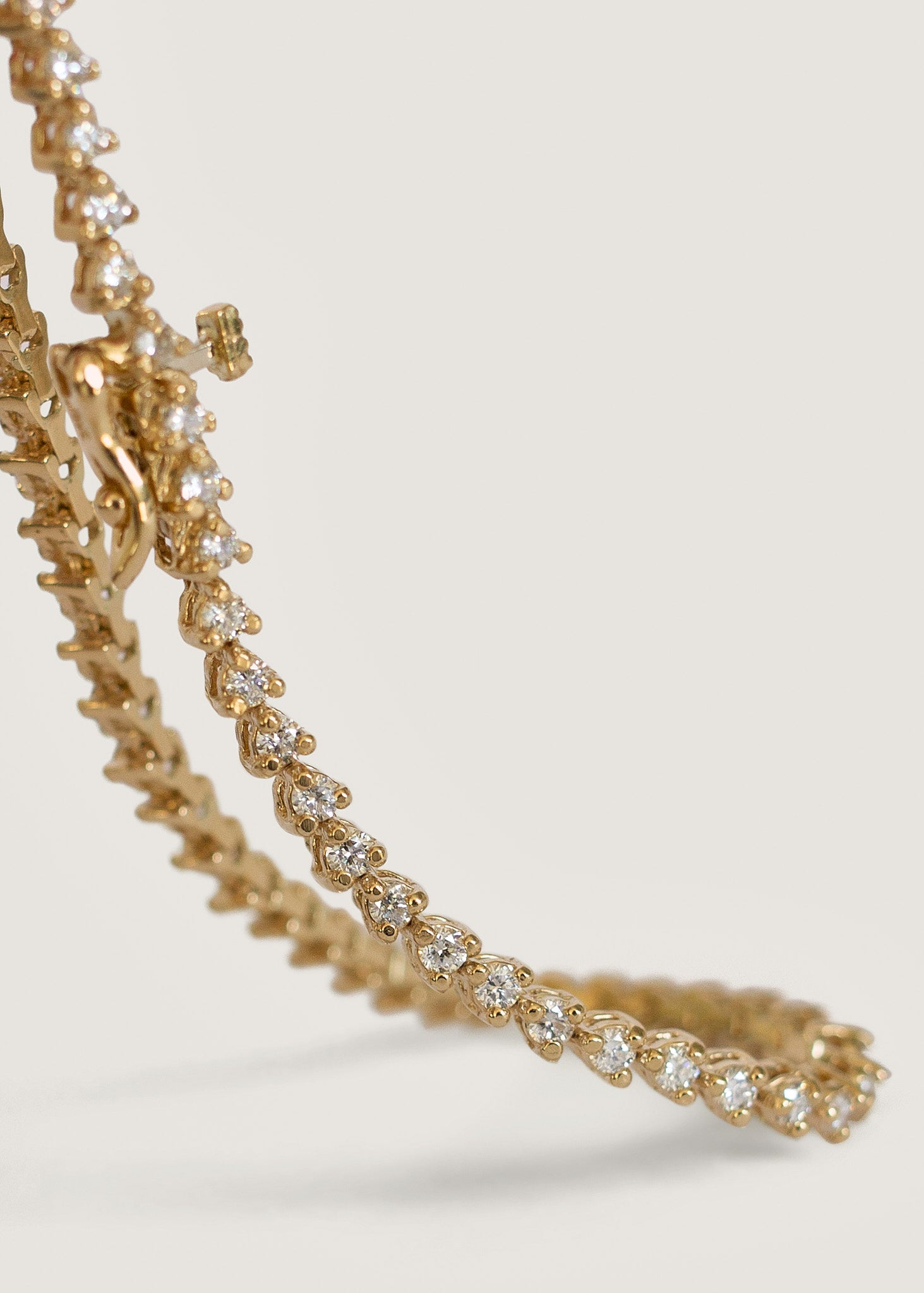 alt="close up of Petite Rachel Three Prong Diamond Tennis Bracelet"
