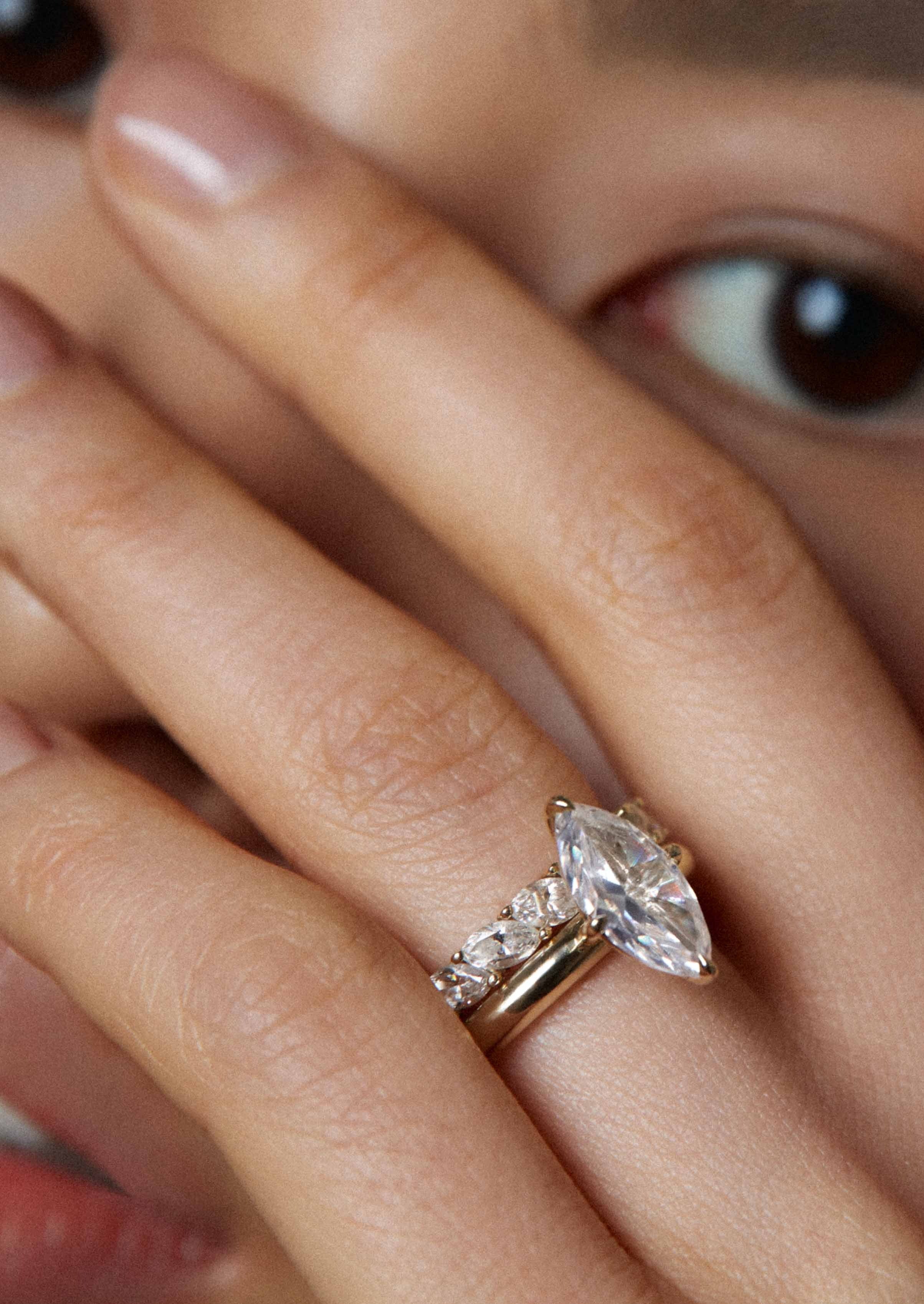alt="The Daphne styled with the Marquise Eternity Ring"