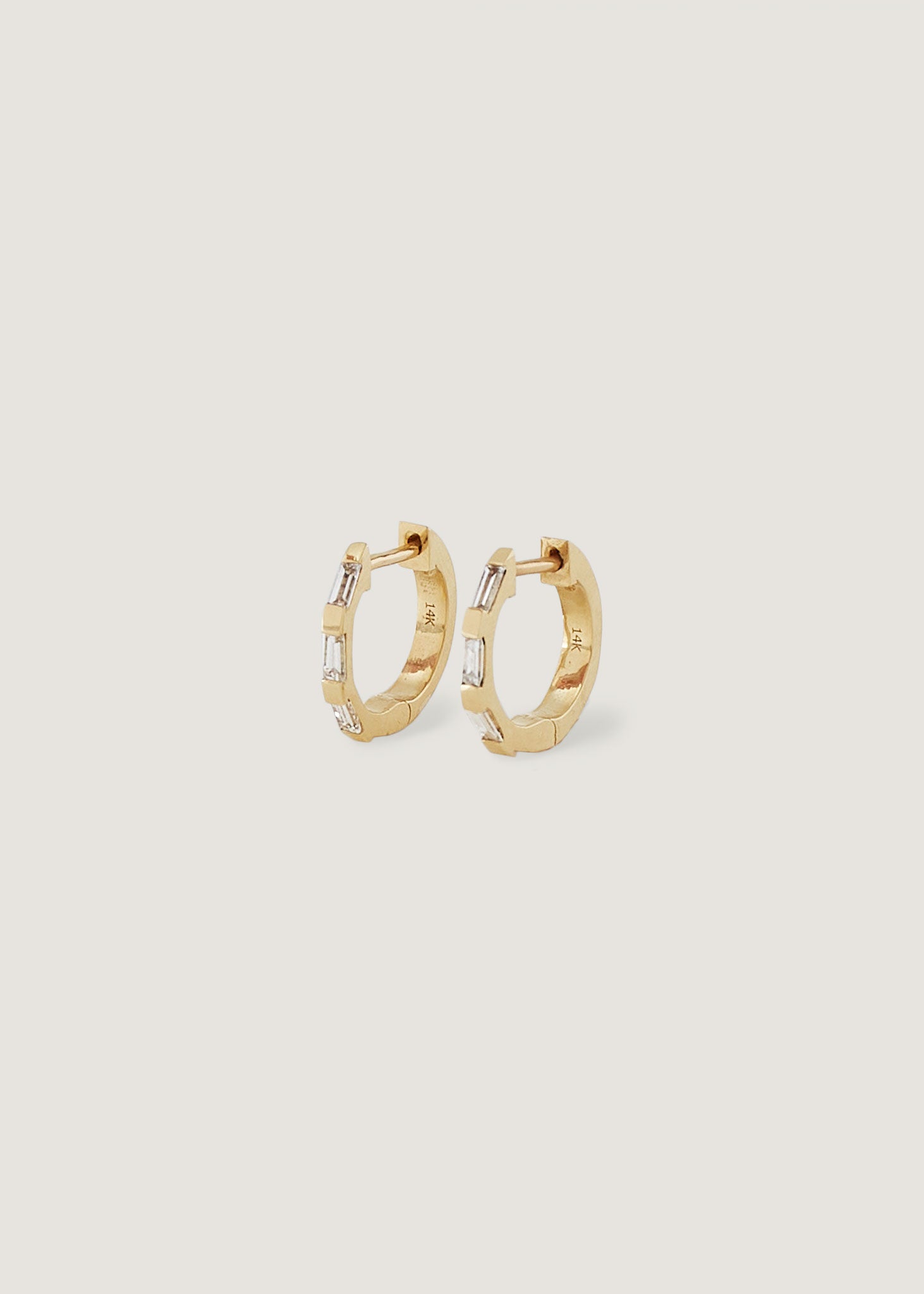 alt="Ellie Baguette Diamond Huggie Earrings"