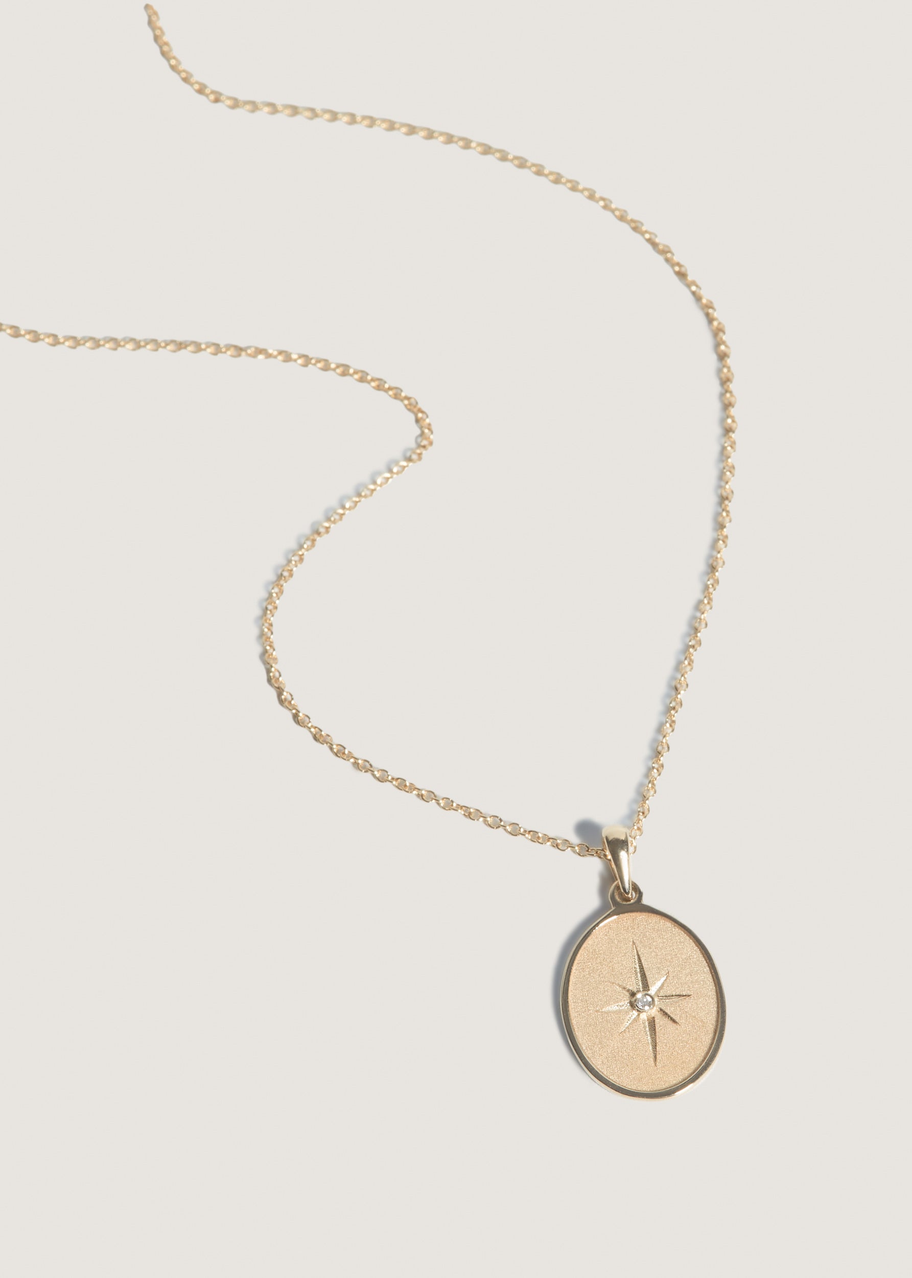 alt="Mother.ly x Kinn North Star Pendant"