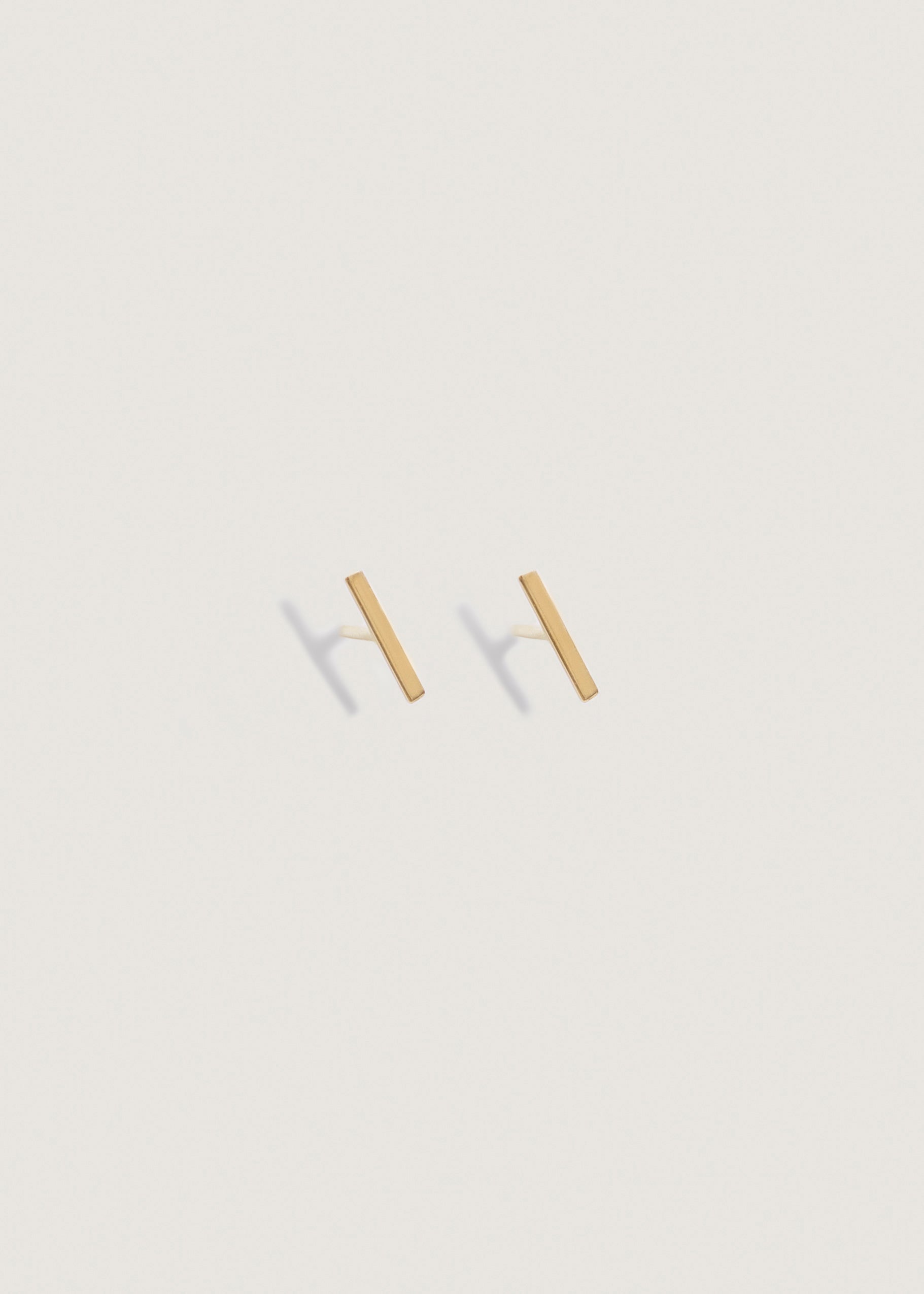alt="Petite Bar Stud Earrings"