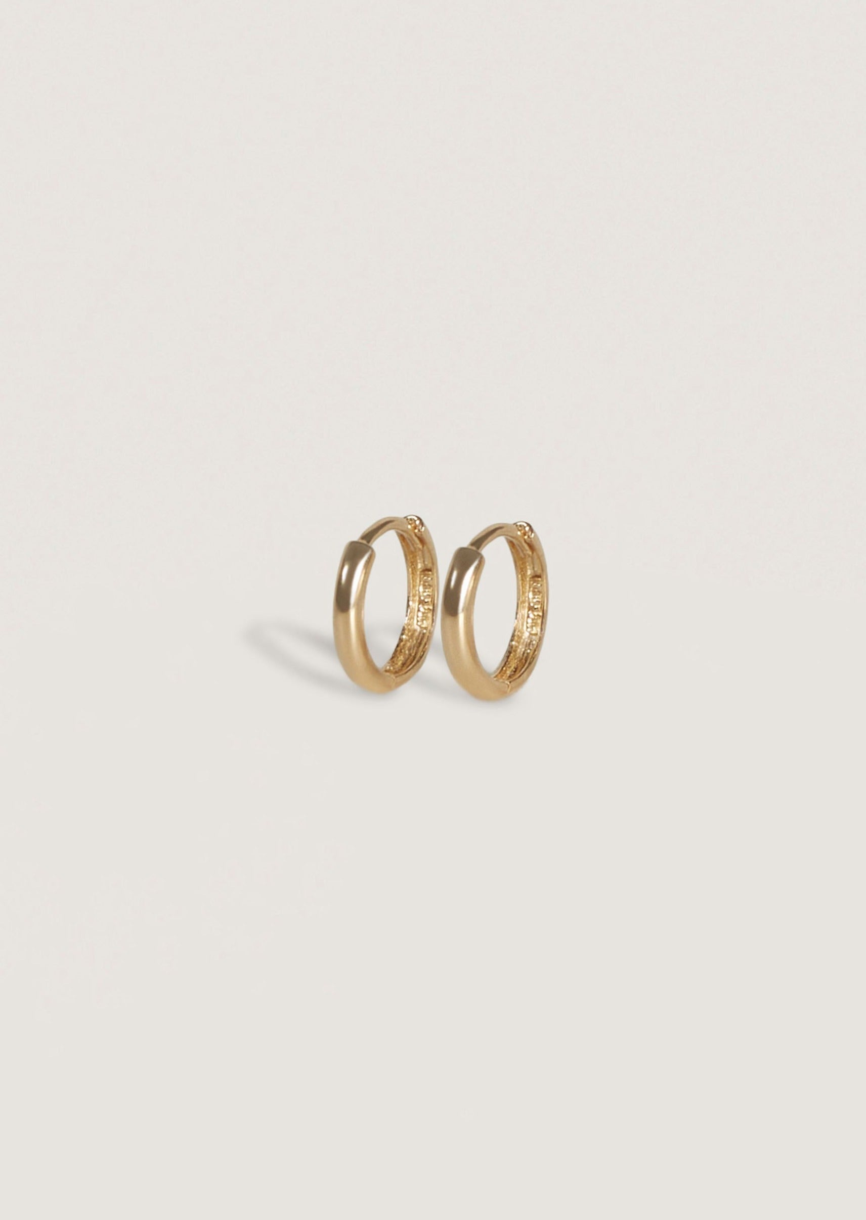 alt="Petite Hoop Huggie Earrings"